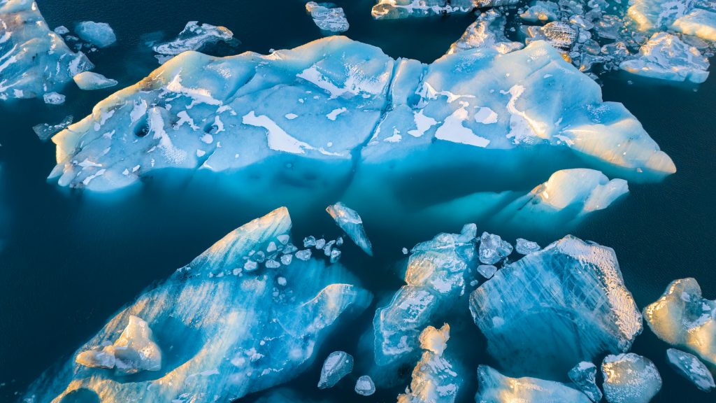 Aerial View of Majestic Icebergs in Pristine Waters